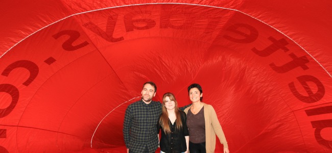 Staff inside the Red Letter Days partly blown up hot air balloon
