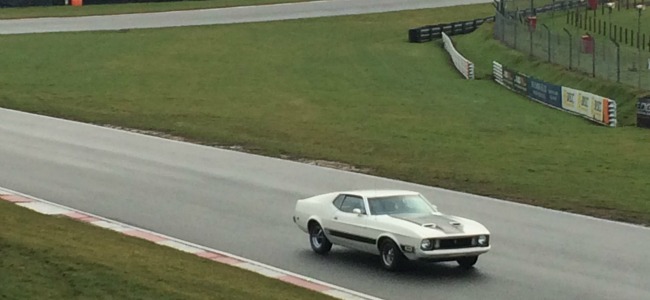 A classic Mustang on the track 