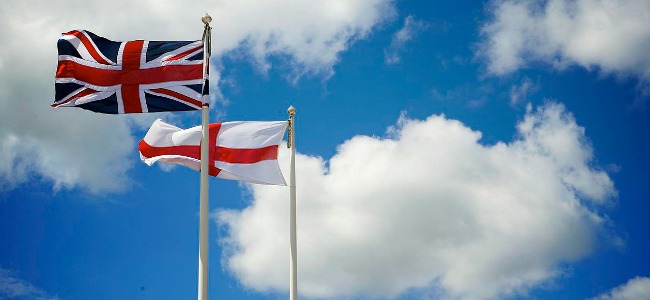 The UnionFlag and StGeorges Cross flying at full mast.